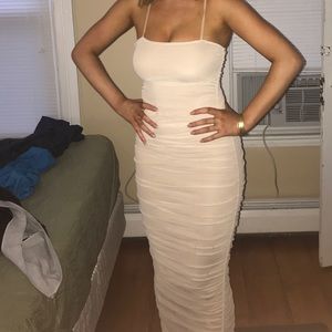 Fitted tan dress with mesh overlay